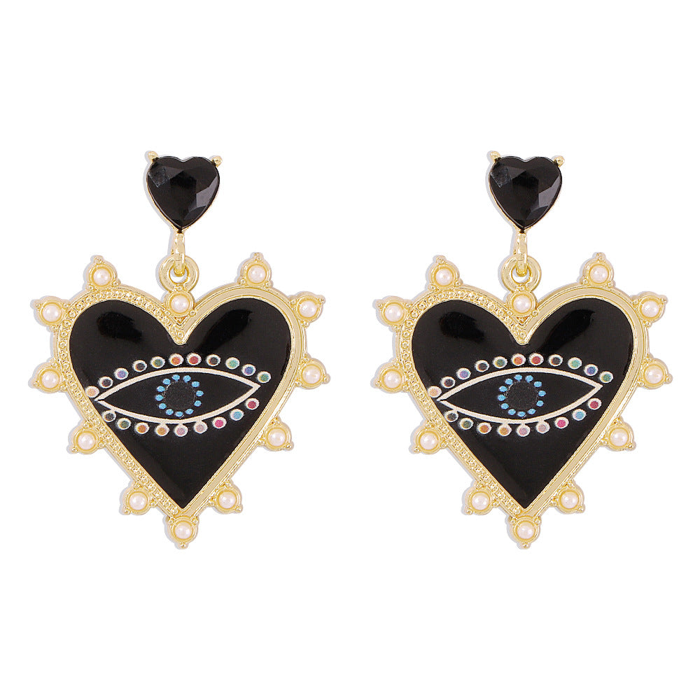 Exaggerated heart-shaped devil's eye earrings