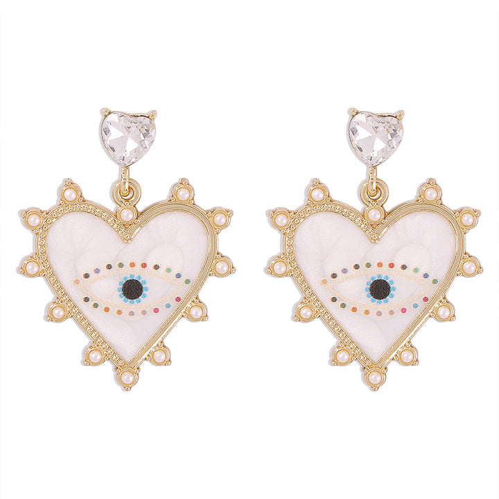 Exaggerated heart-shaped devil's eye earrings