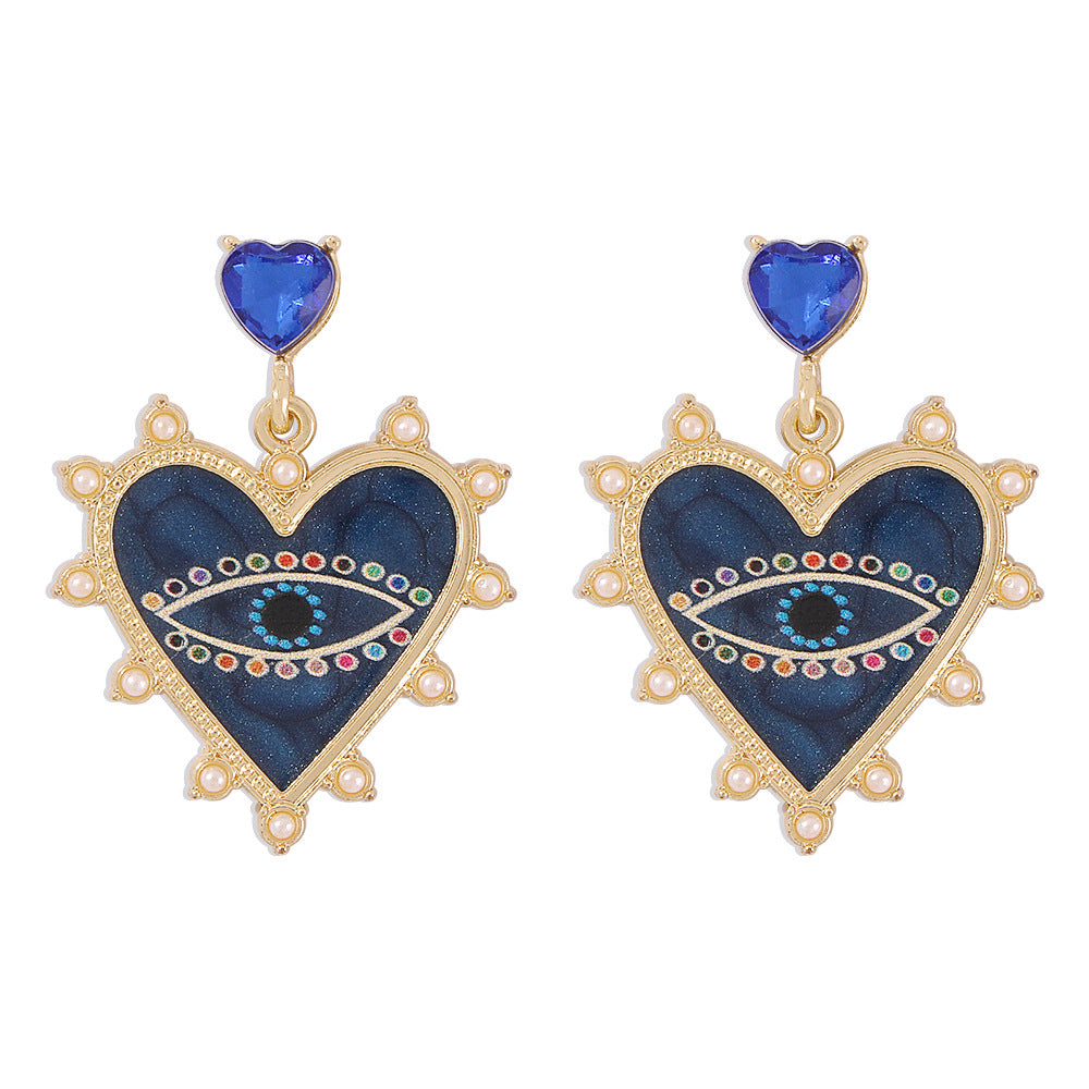 Exaggerated heart-shaped devil's eye earrings