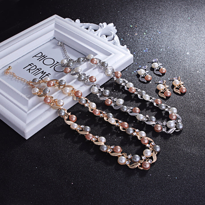 Imitation pearl necklace and earrings set