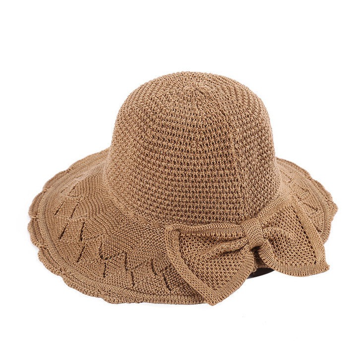 Foldable knitted straw hat with bow