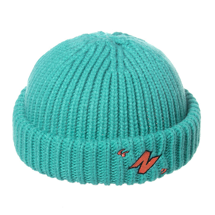 Thick warm knitted melon leather hat