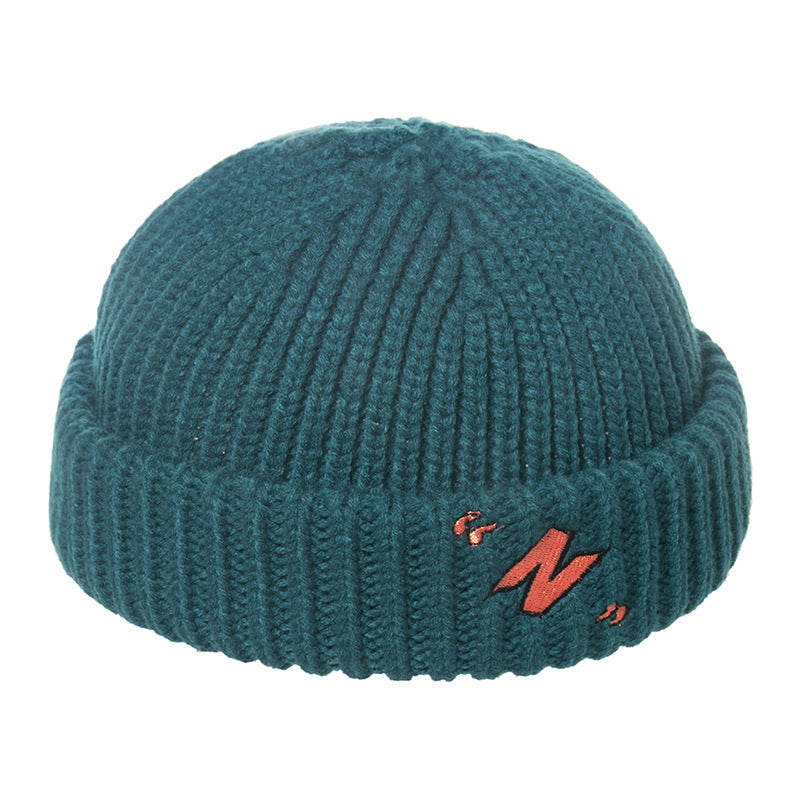 Thick warm knitted melon leather hat