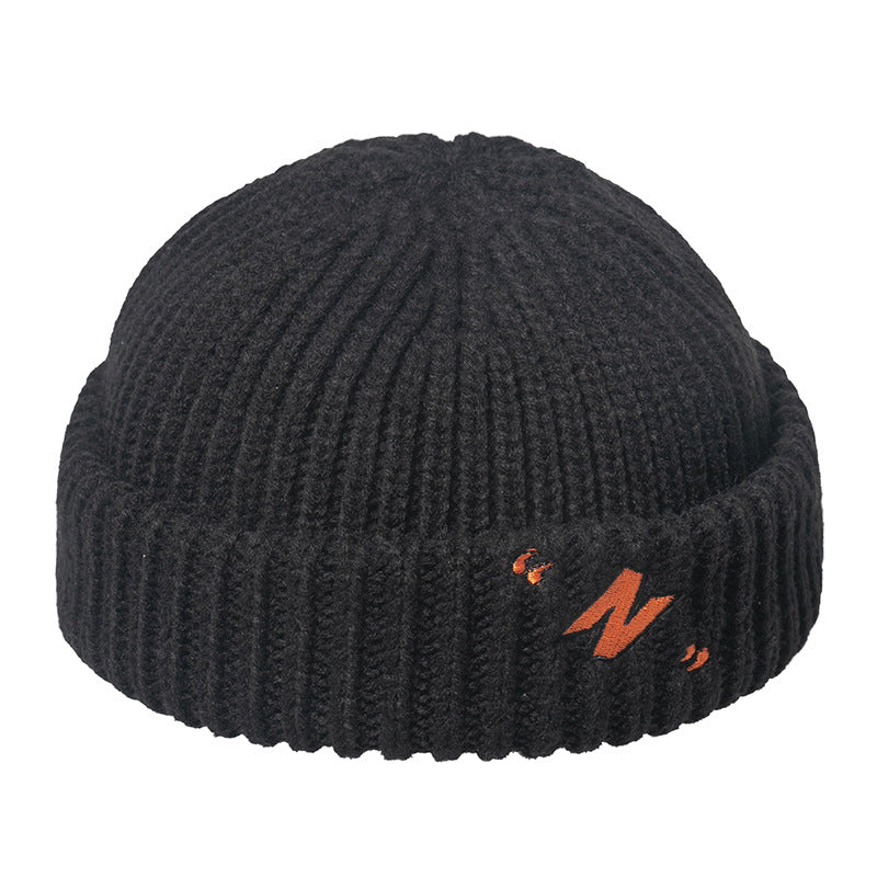 Thick warm knitted melon leather hat