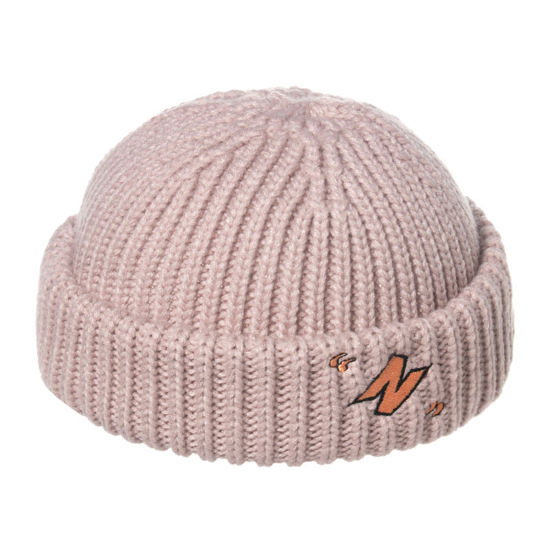 Thick warm knitted melon leather hat