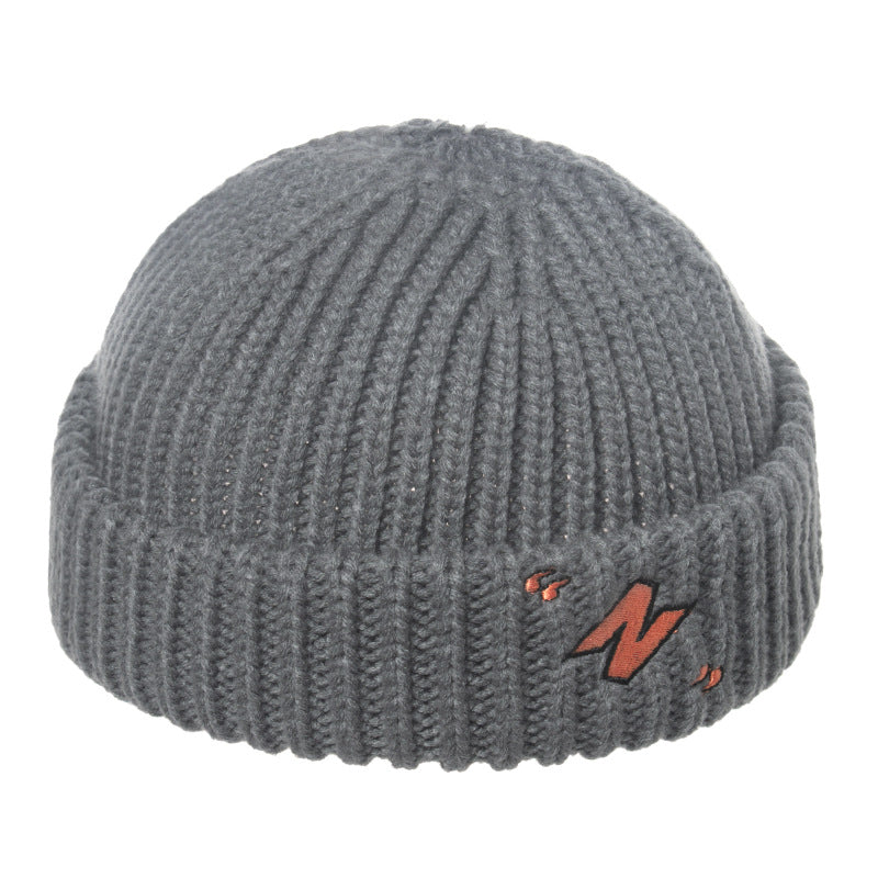 Thick warm knitted melon leather hat