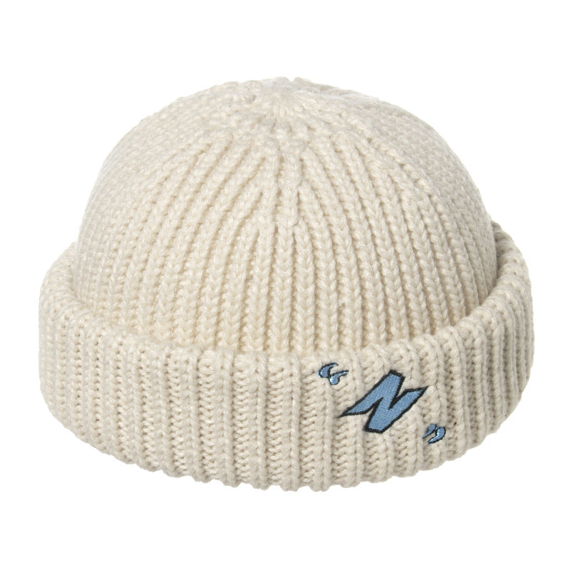 Thick warm knitted melon leather hat