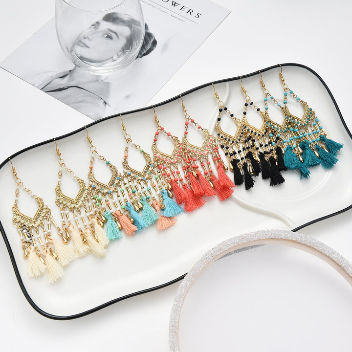 Bohemian hollow dripping oil rice beads fan-shaped tassel long earrings