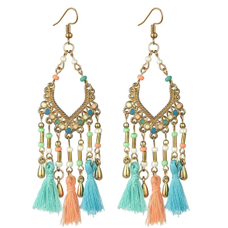 Bohemian hollow dripping oil rice beads fan-shaped tassel long earrings